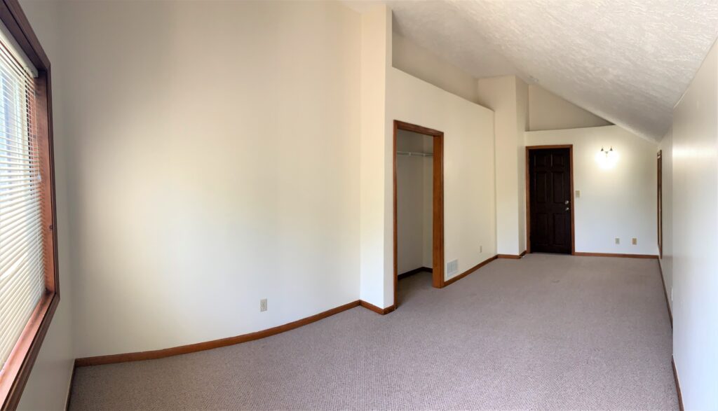 304 Rumsey carpeted bedroom